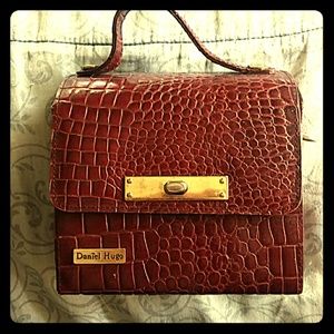 Daniele Hugo clutch purse